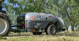 The GEO 3002 air-blast sprayer at work in an orchard of mirabelle plum trees