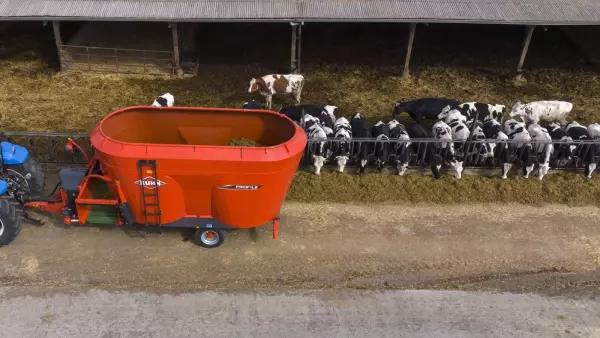 Широка розвантажувальна стрічка для рівномірного розподілу раціону